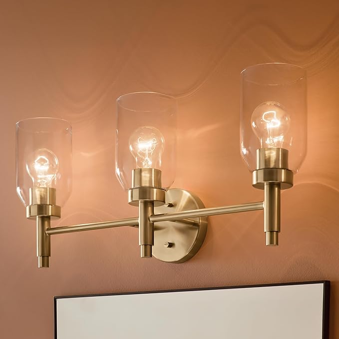 Kichler Madden 3-Light Bathroom Vanity Light Fixture with Clear Glass in Champagne Bronze, Modern Wall Mount Lighting for Single Vanity Mirror (10.5" x 24"), 55185CPZ