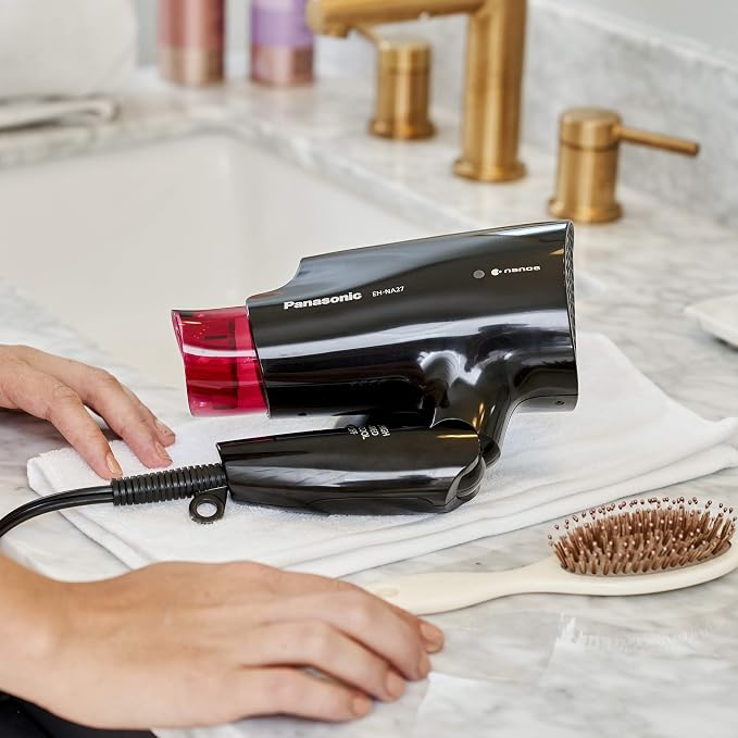 Panasonic nanoe Compact Hair Dryer for Healthy-Looking Hair, 1400W Portable, Folding Handling and Quickdry Nozzle for Fast Drying – EH-NA27-K (Black/Pink)
