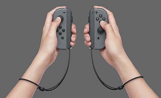 Nintendo Switch Game Console - Black (HAC-001(-01) w/ OEM Gray Joy Cons (Renewed)