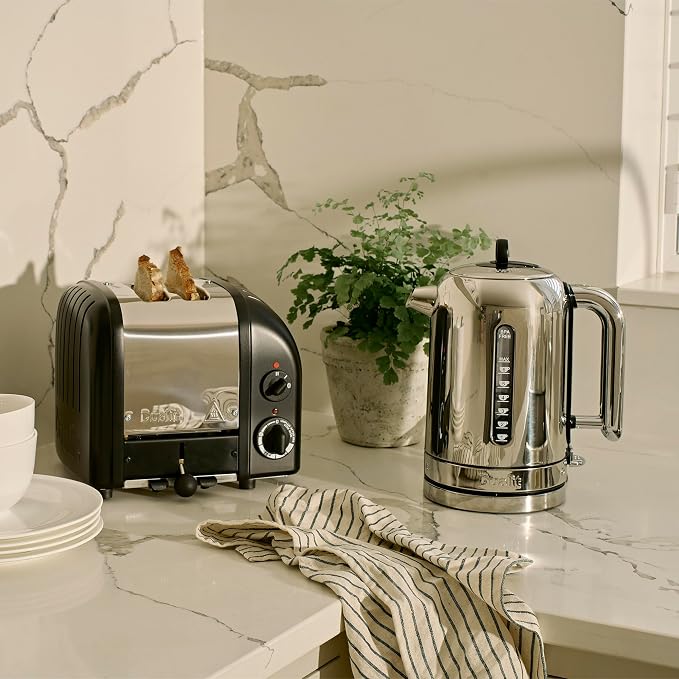 Dualit Classic 2 Slice NewGen Toaster - Stainless Steel - Hand Built in the UK - Replaceable ProHeat elements - Defrost Bread - Mechanical Timer - Matt Black Classic Toaster